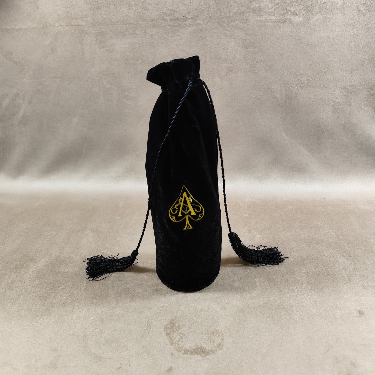 Etui à bouteille Champagne Armand de Brignac en tissu noir
