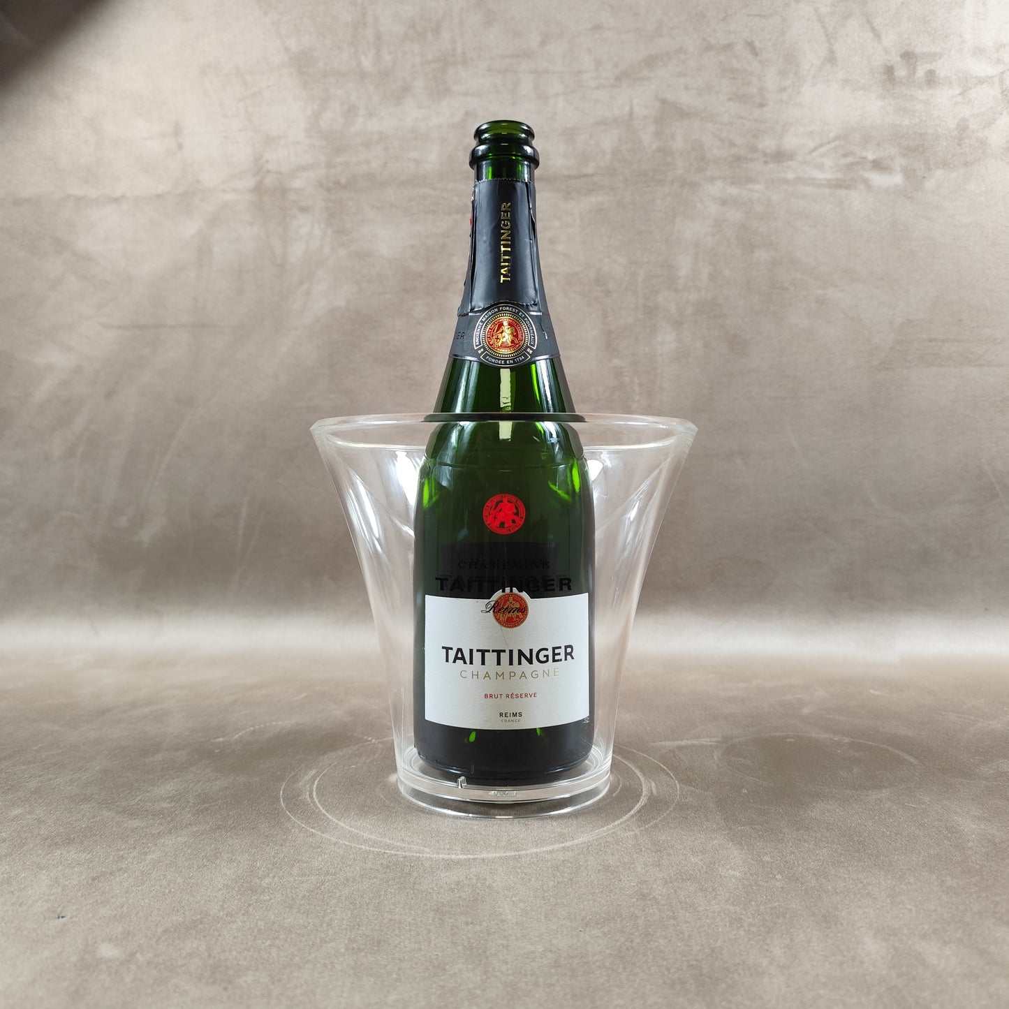 Taittinger Vintage Champagnerkühler aus transparentem Kunststoff. Hergestellt in Frankreich.