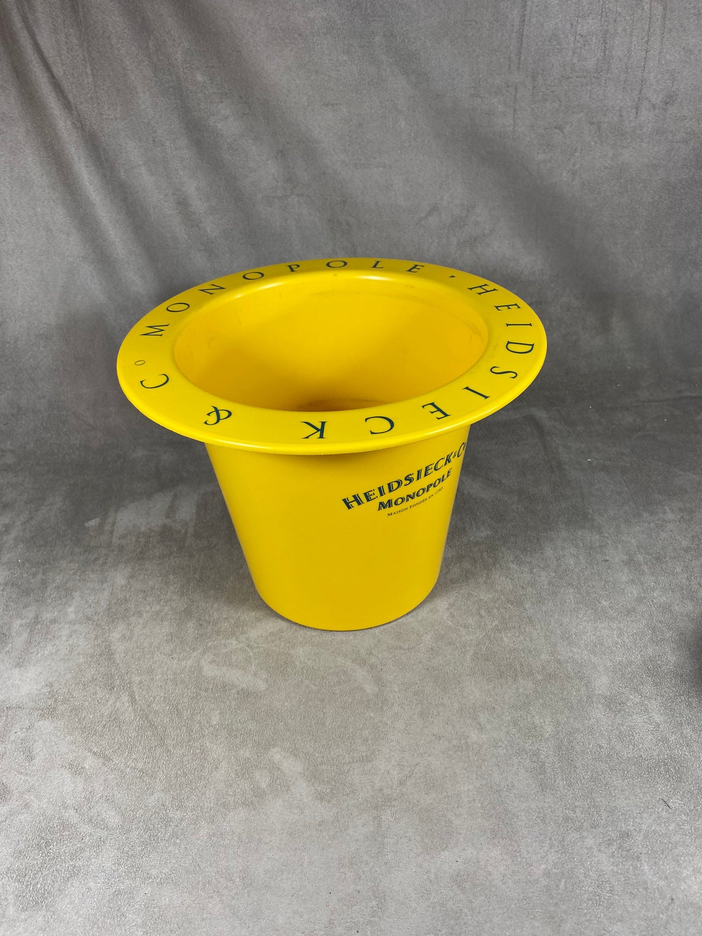 Seau à champagne Heidsieck&Co Monopole en plastique jaune vintage