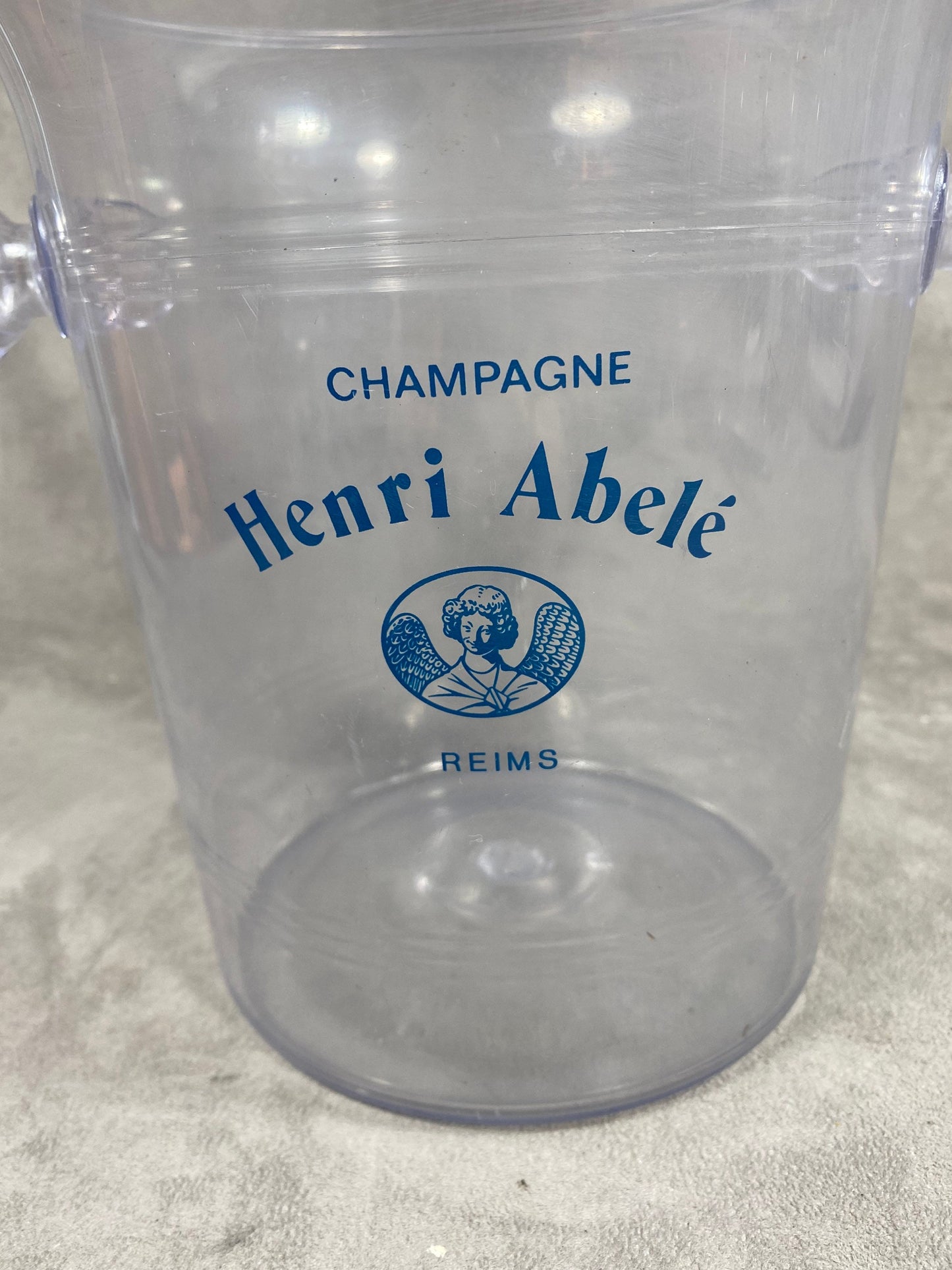 Seau à Champagne en plastique transparent à décor de l'ange au sourire de Reims Champagne Henri Abelé Reims Années 1990