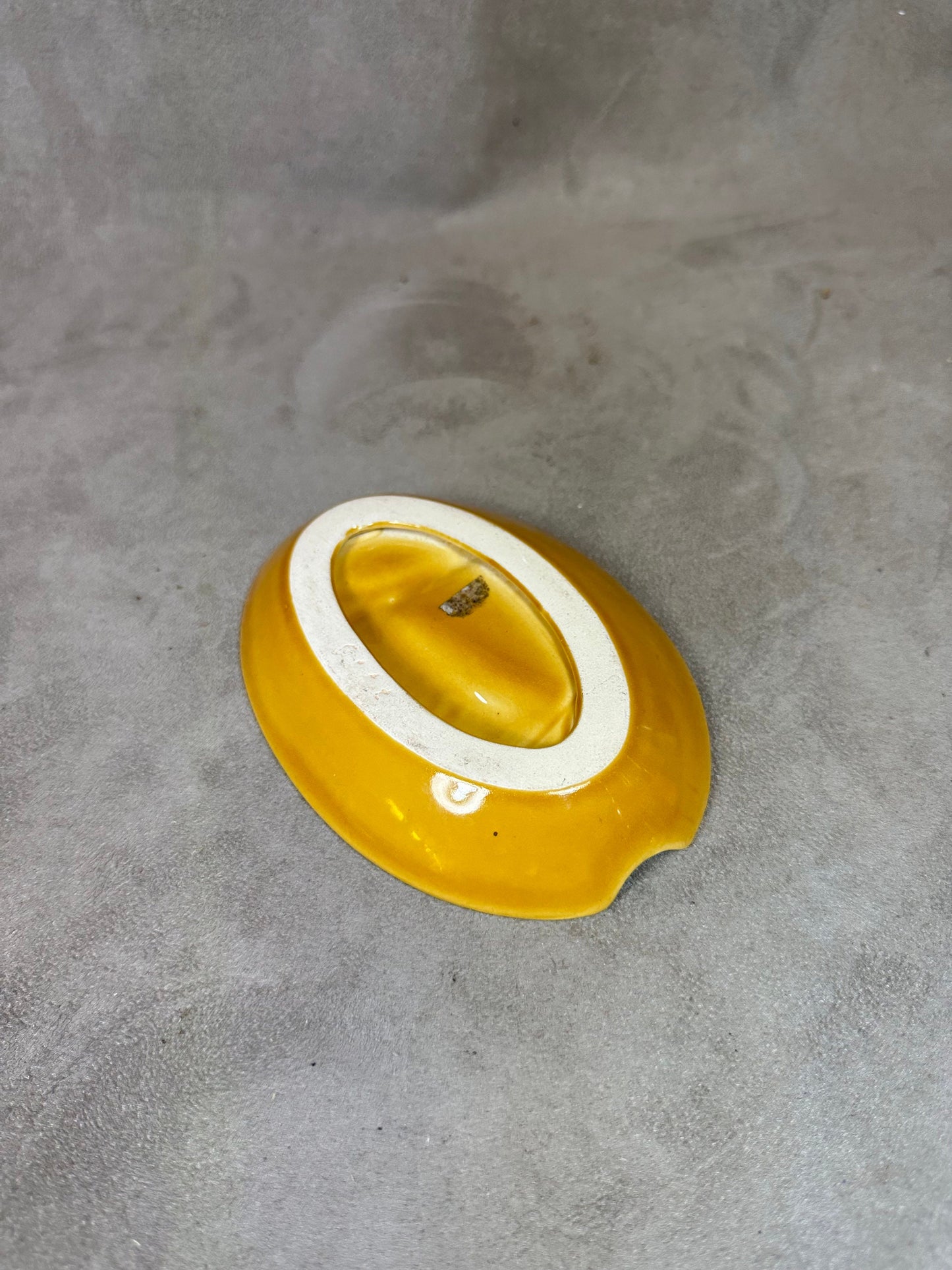 Yellow ceramic ashtray from the Douaumont ossuary Souvenir of Verdun Made in France 1960s