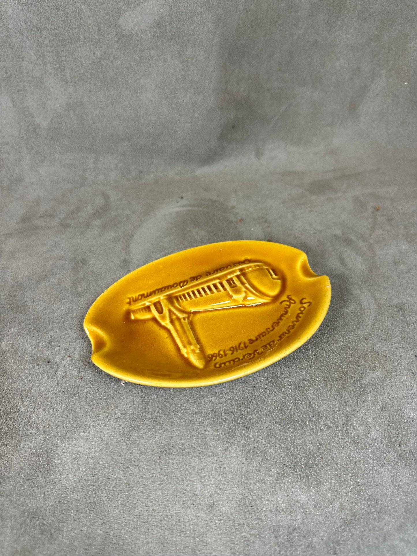 Yellow ceramic ashtray from the Douaumont ossuary Souvenir of Verdun Made in France 1960s
