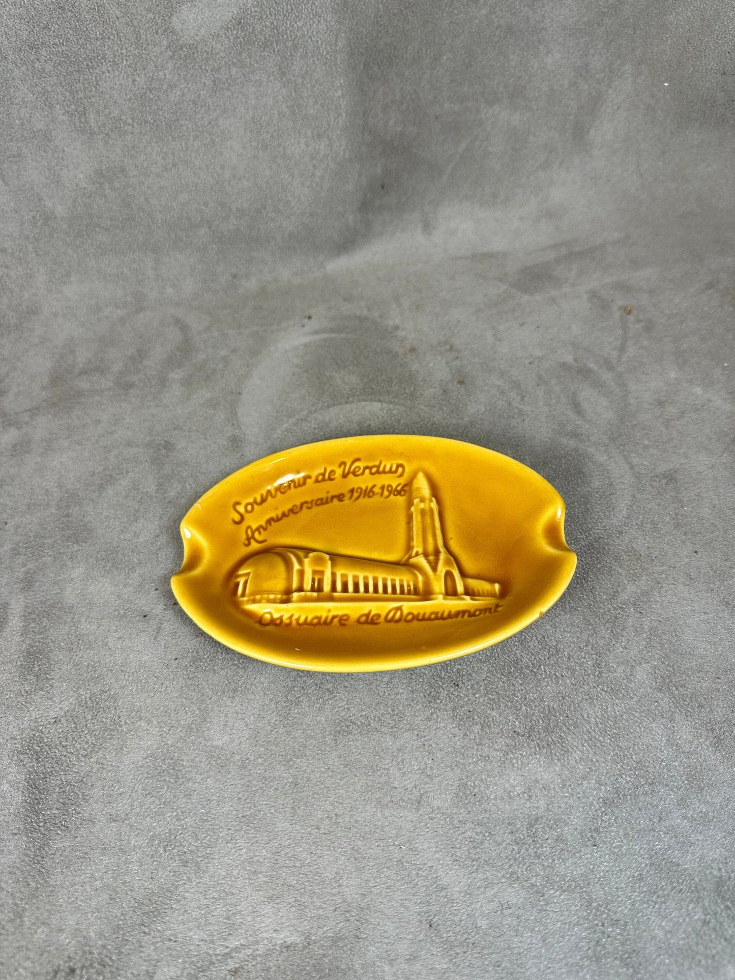 Yellow ceramic ashtray from the Douaumont ossuary Souvenir of Verdun Made in France 1960s