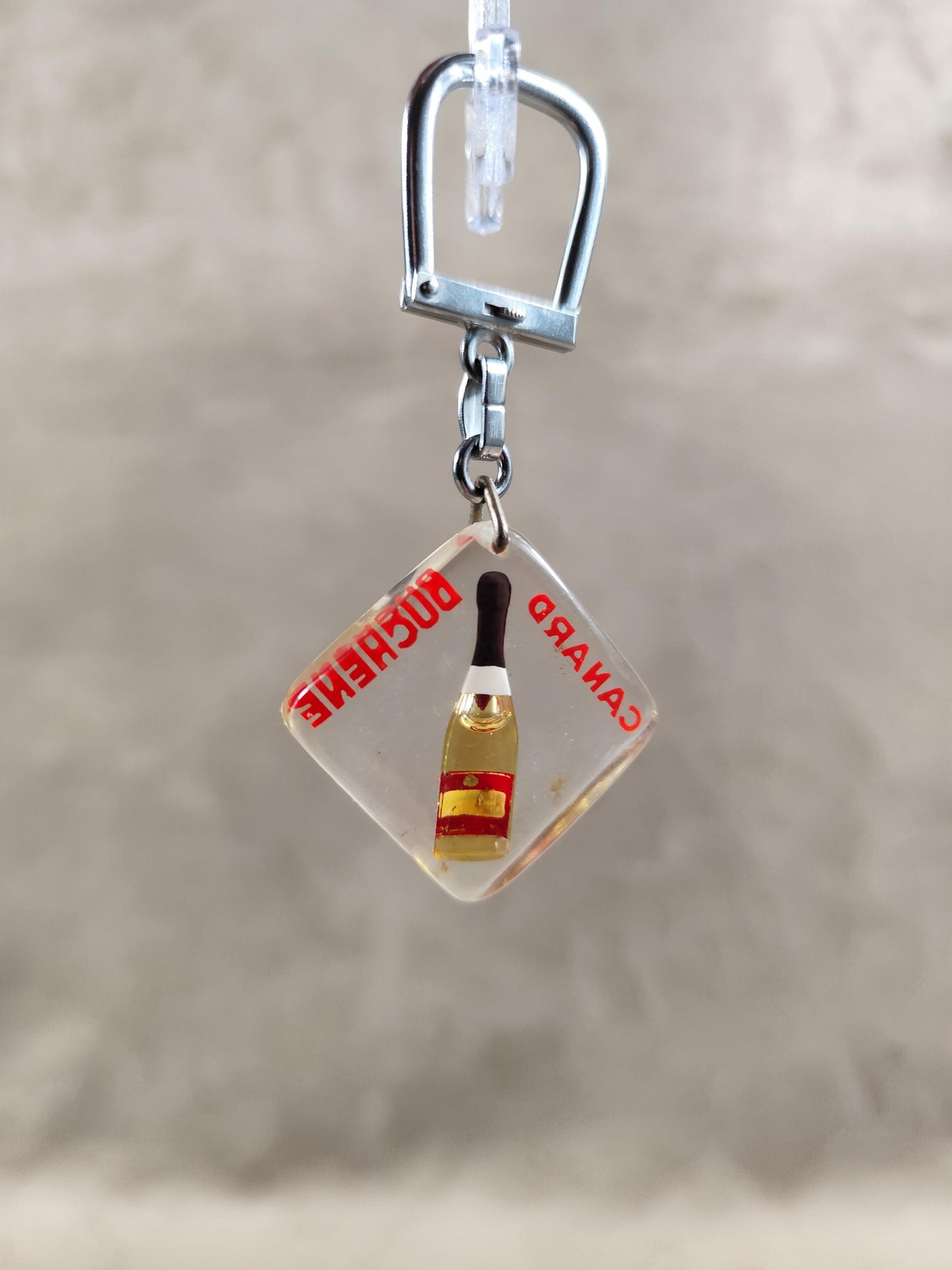Porte clés Bourbon à bulle Champagne Canard Duchêne Made in France Vintage 1970