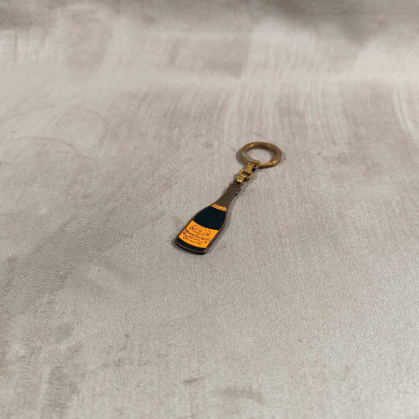 Porte clés Veuve Clicquot en acier Made in France Années 1980