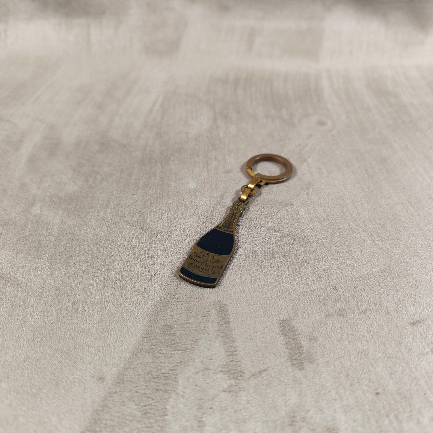 Porte clés Veuve Clicquot en acier Made in France Années 1980