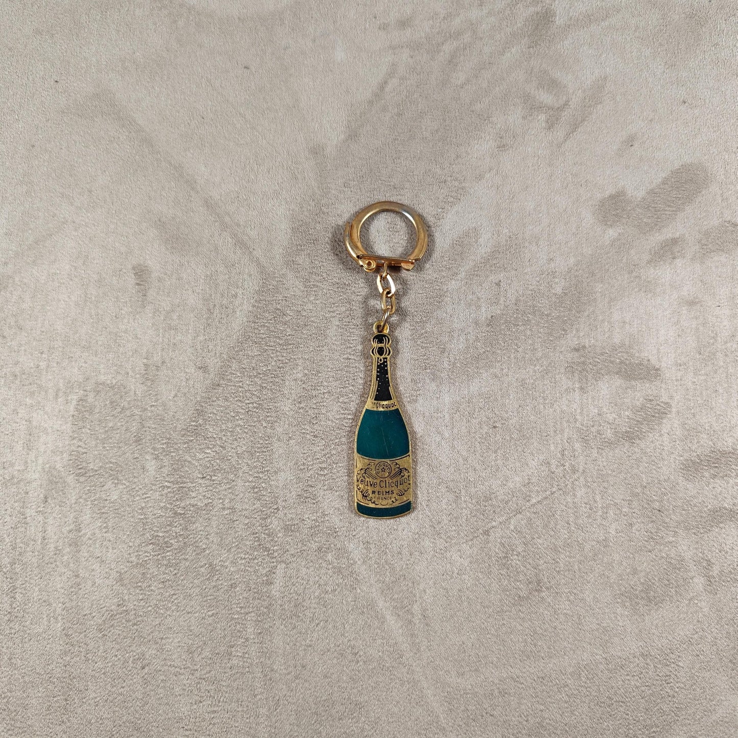 Porte clés Veuve Clicquot en acier Made in France Années 1980