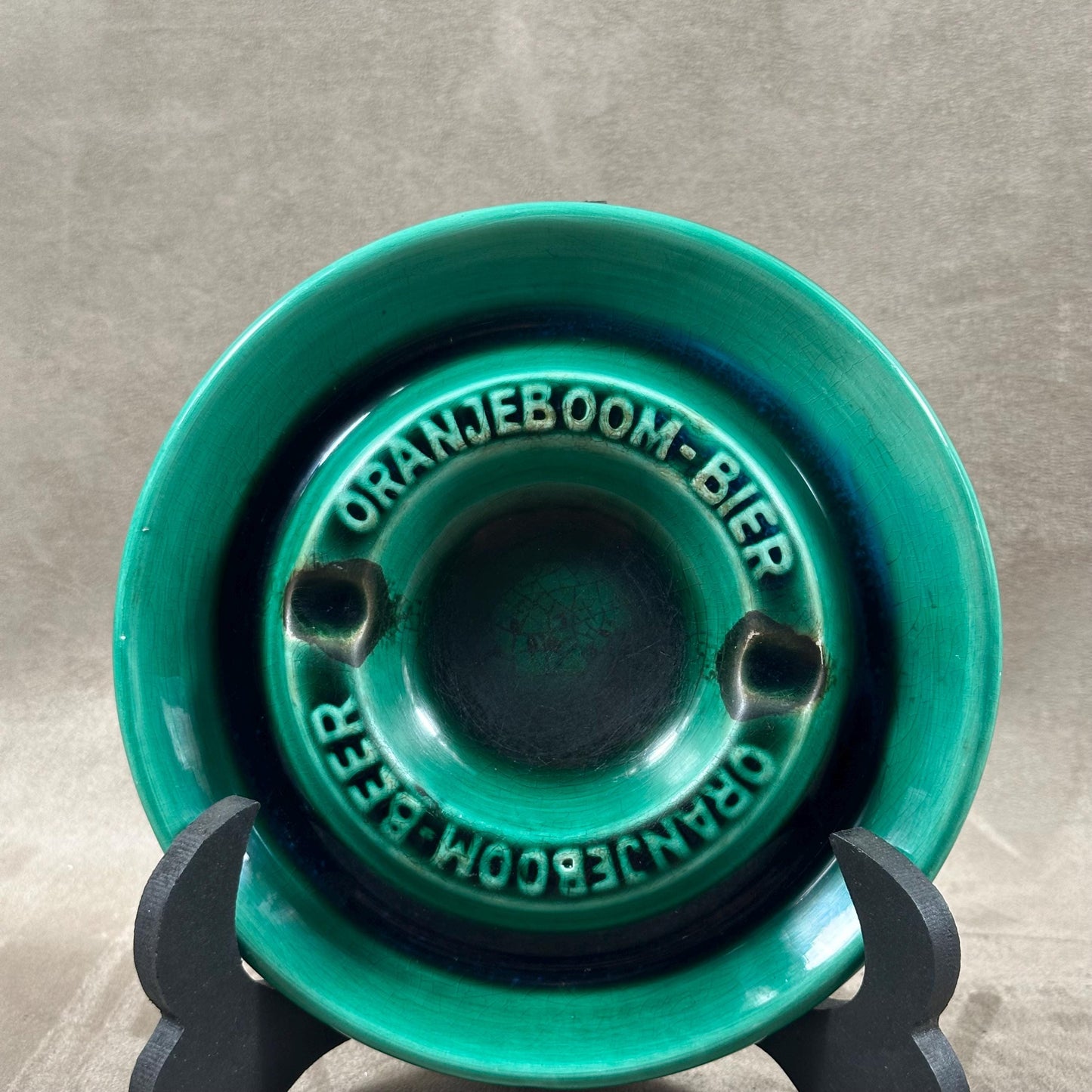 Cendrier publicitaire vintage Oranjeboom-Bier vert en faience 1950