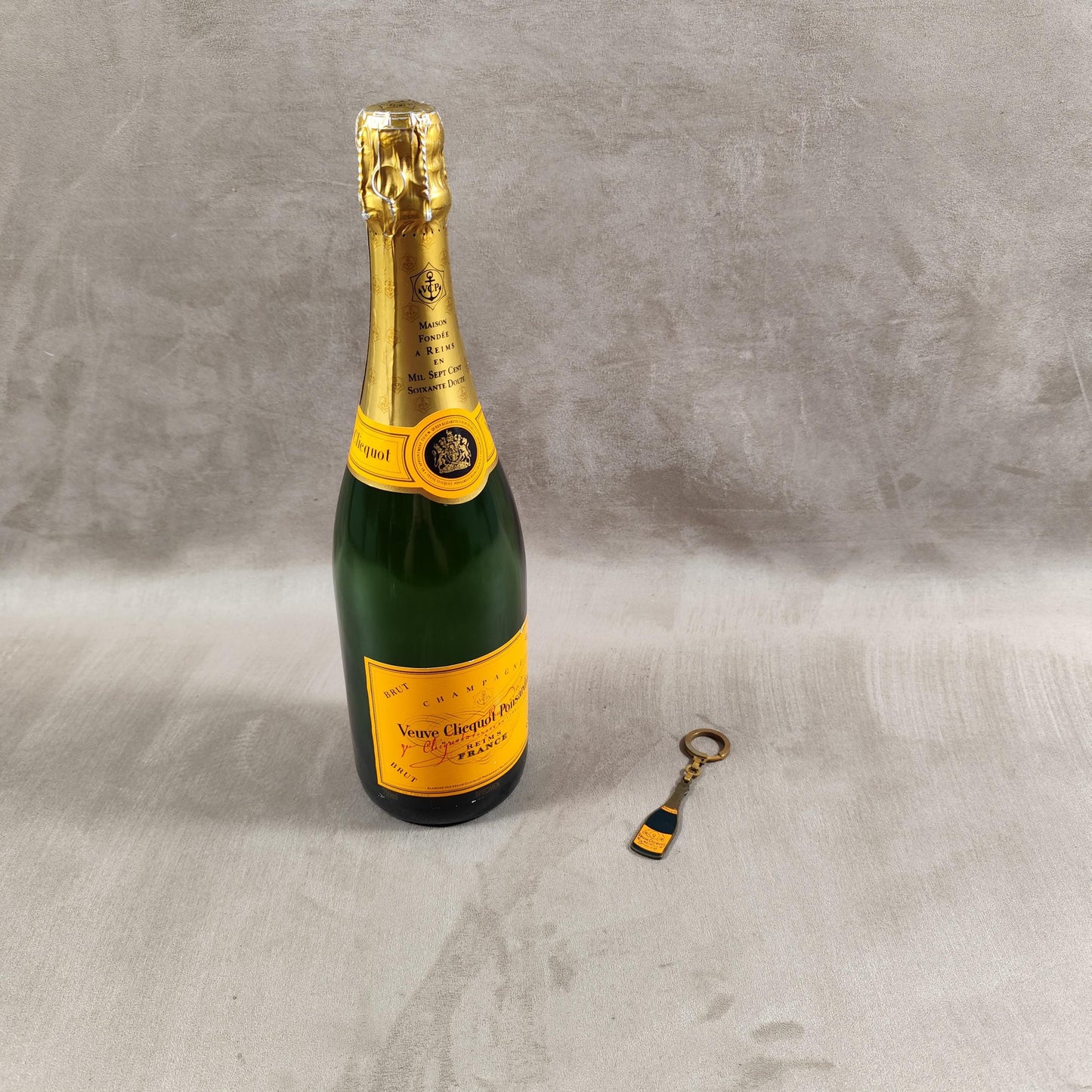 Porte clés Veuve Clicquot en acier Made in France Années 1980