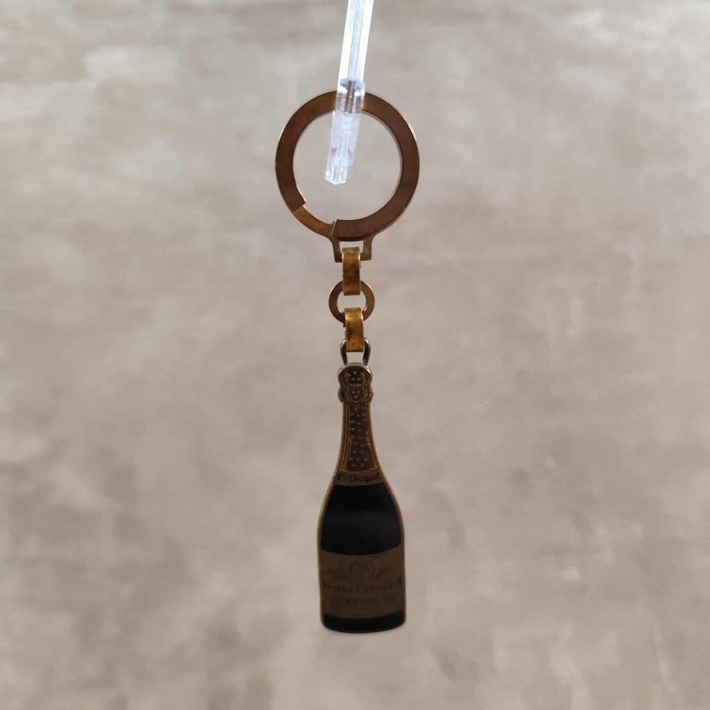 Porte clés Veuve Clicquot en acier Made in France Années 1980