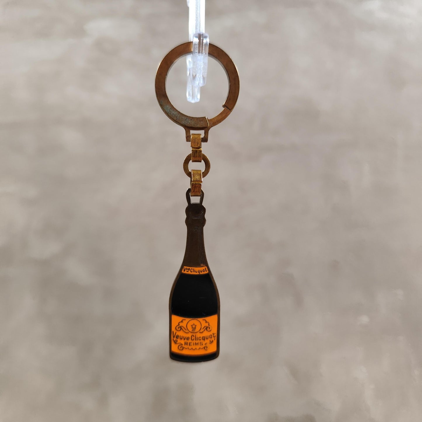 Porte clés Veuve Clicquot en acier Made in France Années 1980