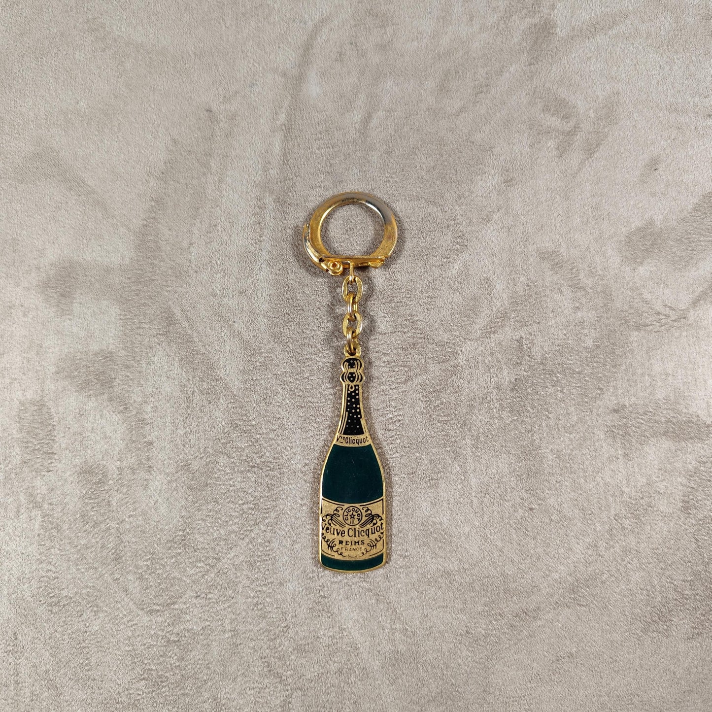Porte clés Veuve Clicquot en acier Made in France Années 1980