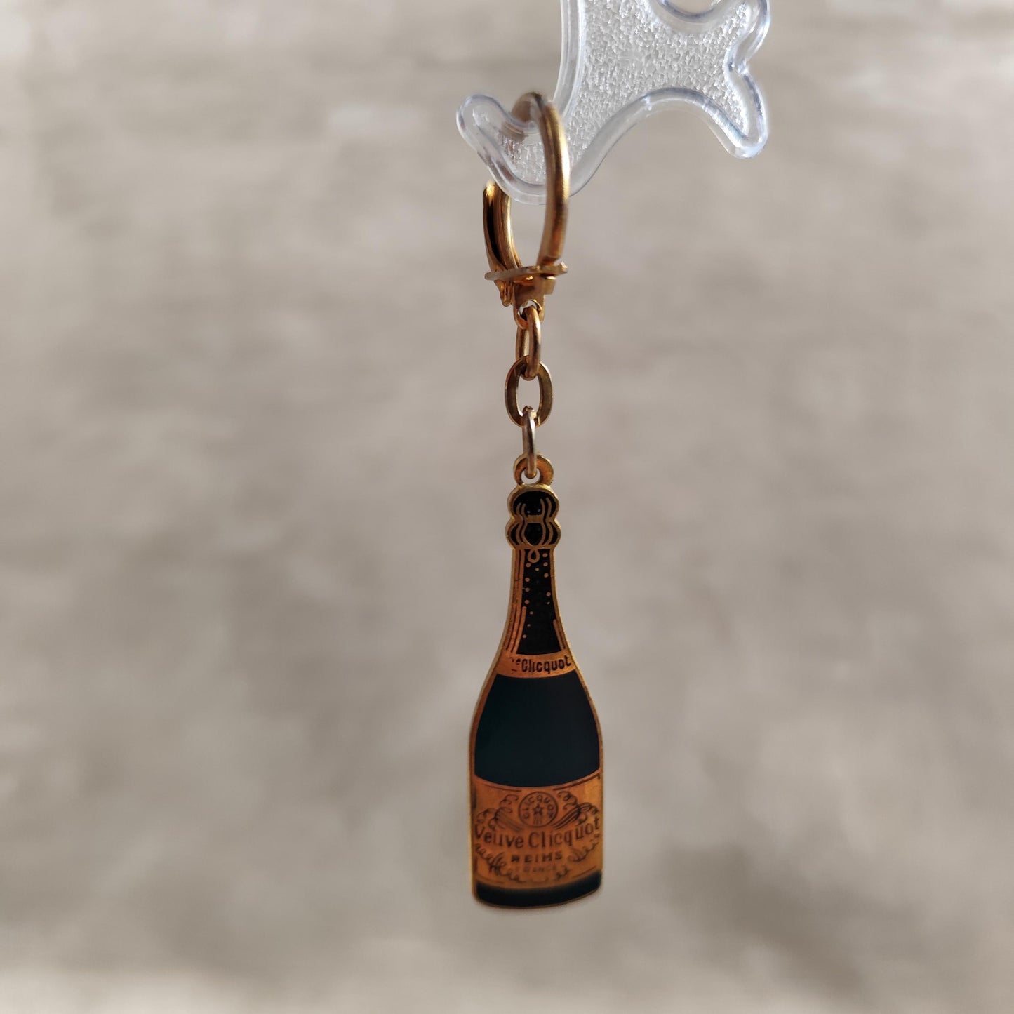 Porte clés Veuve Clicquot en acier Made in France Années 1980