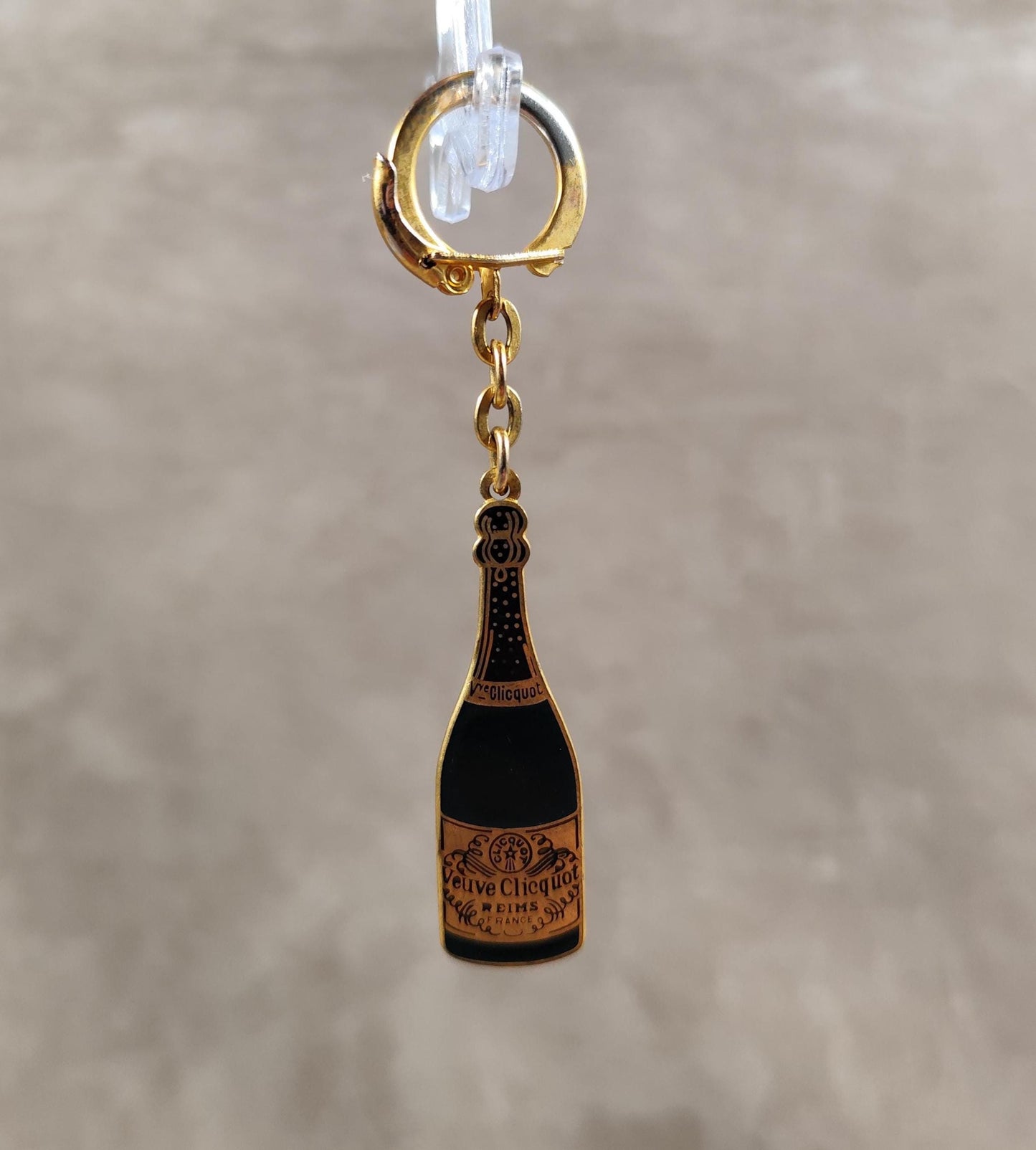 Porte clés Veuve Clicquot en acier Made in France Années 1980