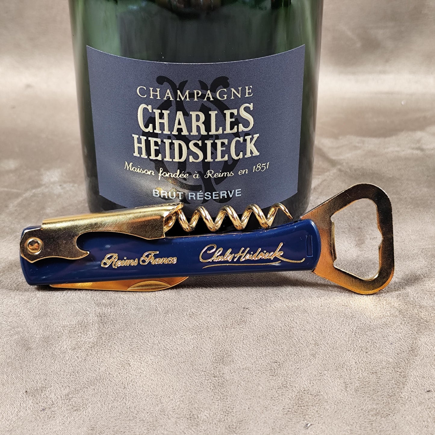 Décapsuleur, Tire-bouchon Champagne Charles Heidsieck en plastique bleu Made in France Vintage 1980