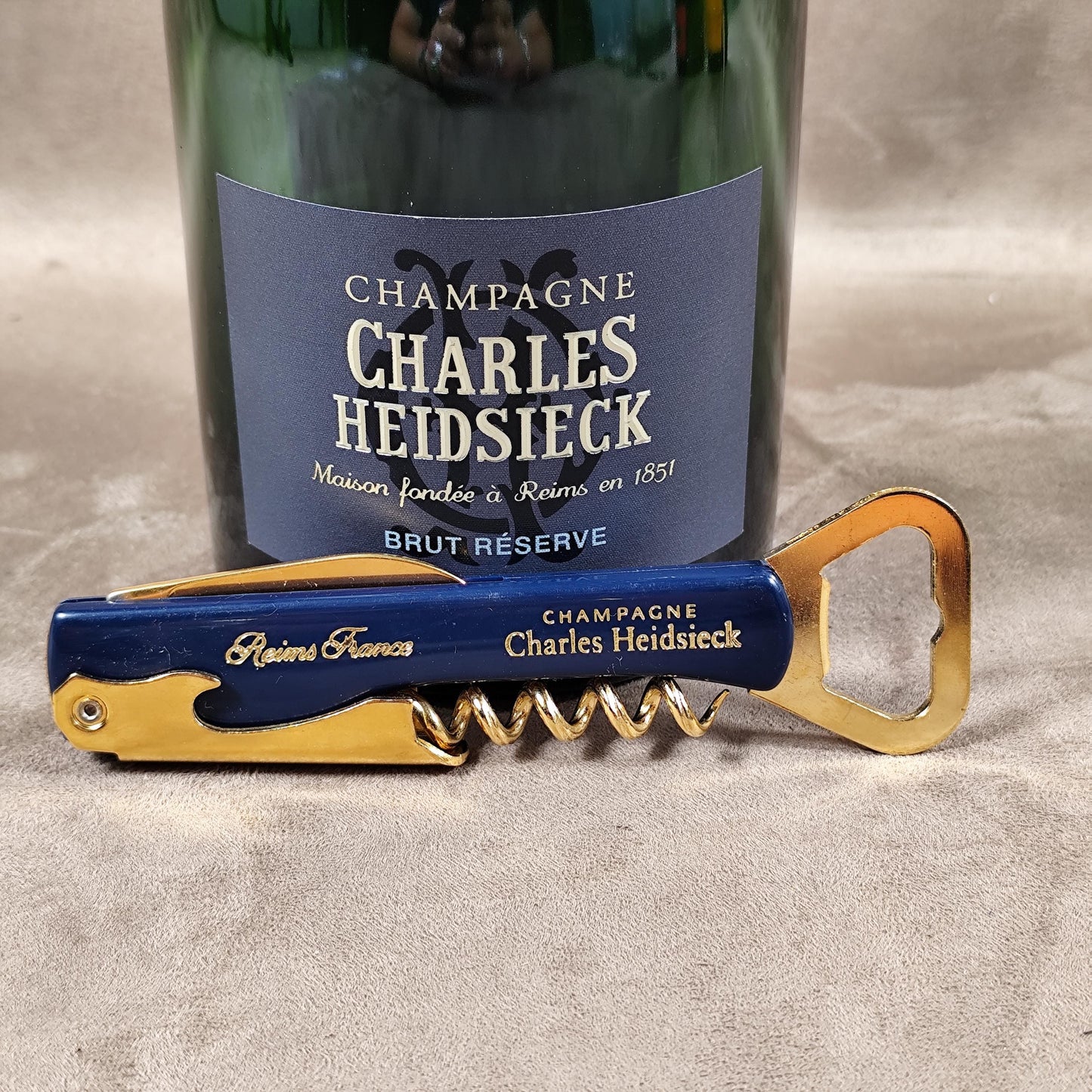 Décapsuleur, Tire-bouchon Champagne Charles Heidsieck en plastique bleu Made in France Vintage 1980