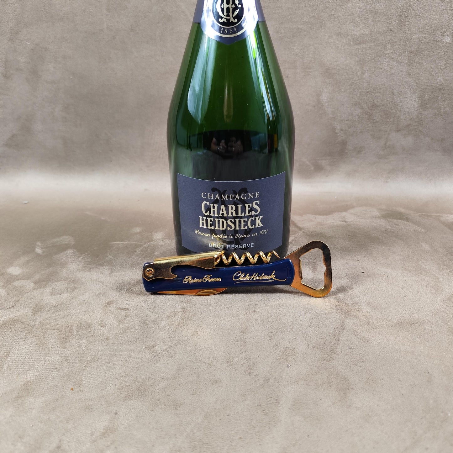 Décapsuleur, Tire-bouchon Champagne Charles Heidsieck en plastique bleu Made in France Vintage 1980
