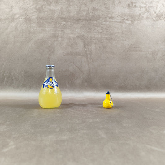 Porte-clés bouteille Orangina miniature Gadget publicitaire vintage