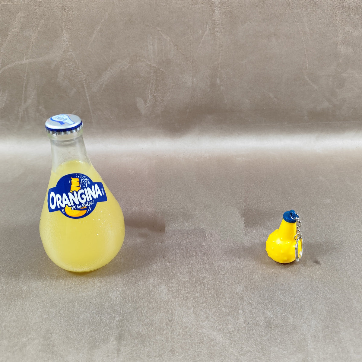 Porte-clés bouteille Orangina miniature Gadget publicitaire vintage