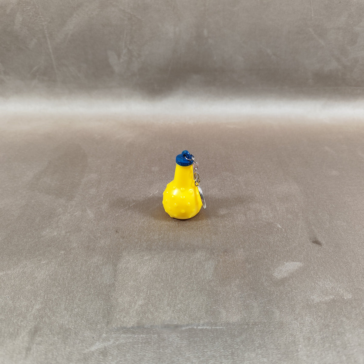 Porte-clés bouteille Orangina miniature Gadget publicitaire vintage