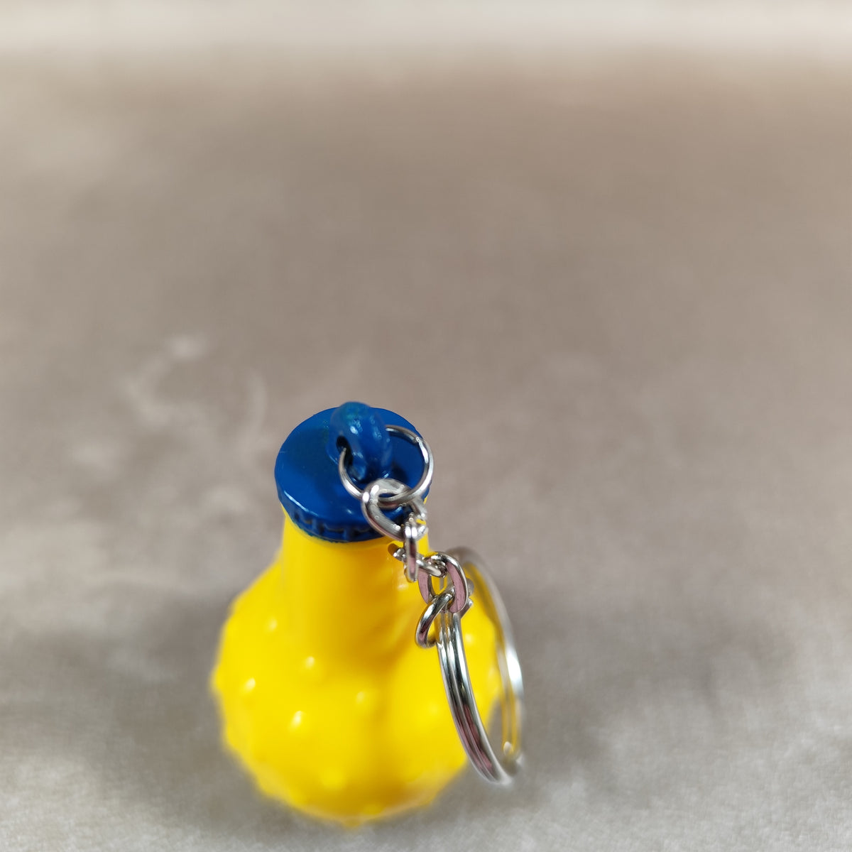 Porte-clés bouteille Orangina miniature Gadget publicitaire vintage