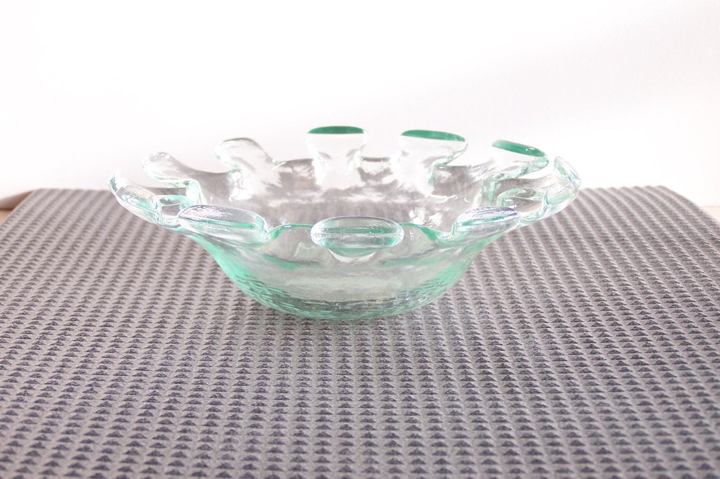 Glass ashtray or glass pocket emptier vintage crenellated ashtray