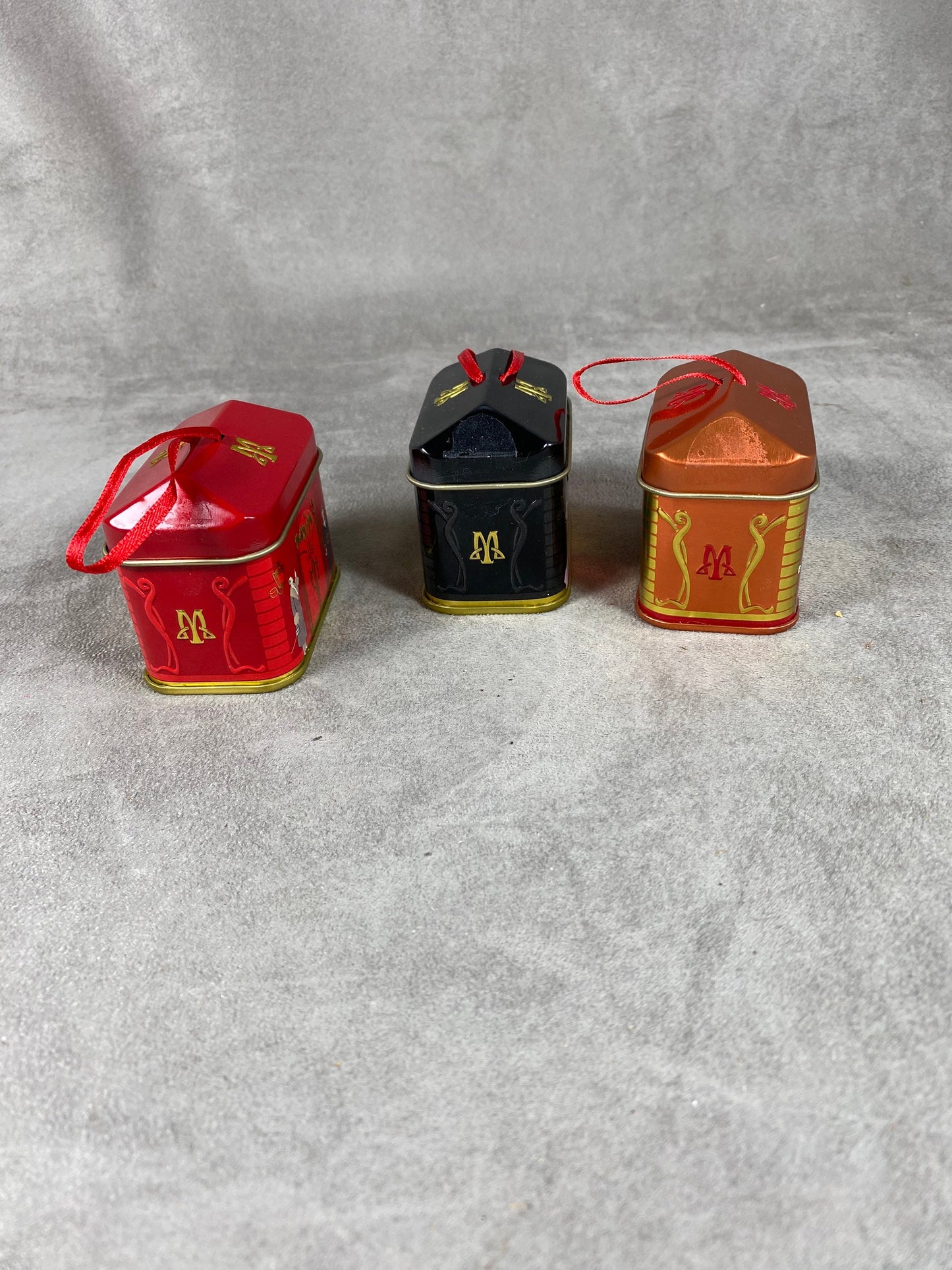 Lot of 3 empty red, black and brown aluminum boxes Maxim's de Paris 1970s