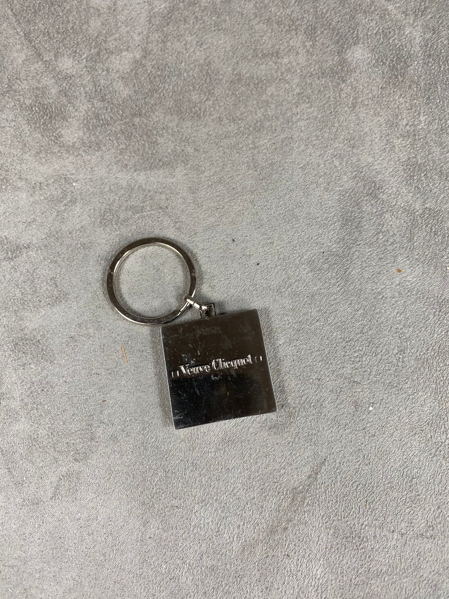 Veuve Clicquot prestige line key ring in steel and lacquer Made in France 1980s