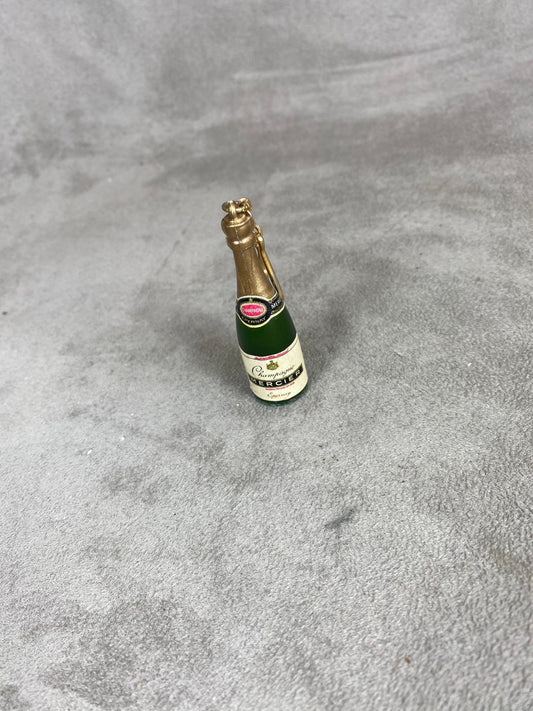Porte clés Mercier à décor de bouteille de champagne  Made in France Années 1960