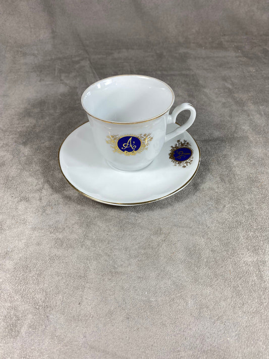 Pretty little ceramic coffee cup marked with a vintage A Made in France