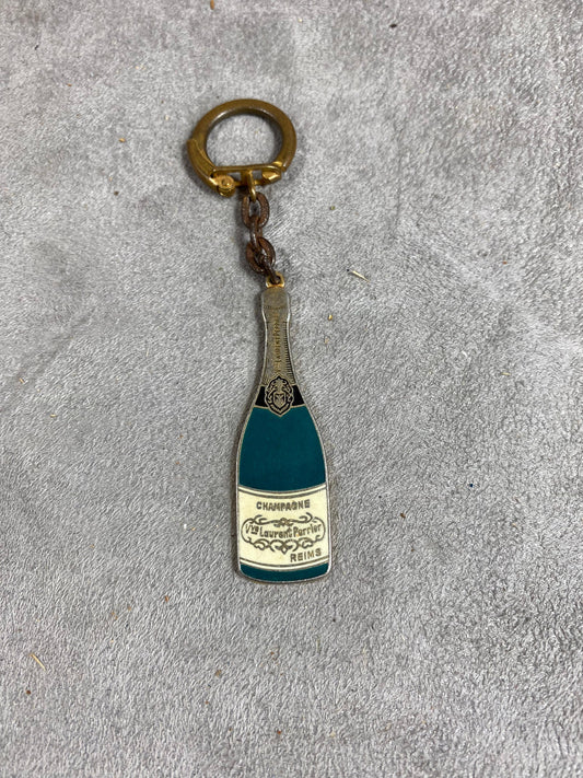 Porte clés Laurent-Perrier en forme de bouteille de champagne vintage   Made in France Années 1980