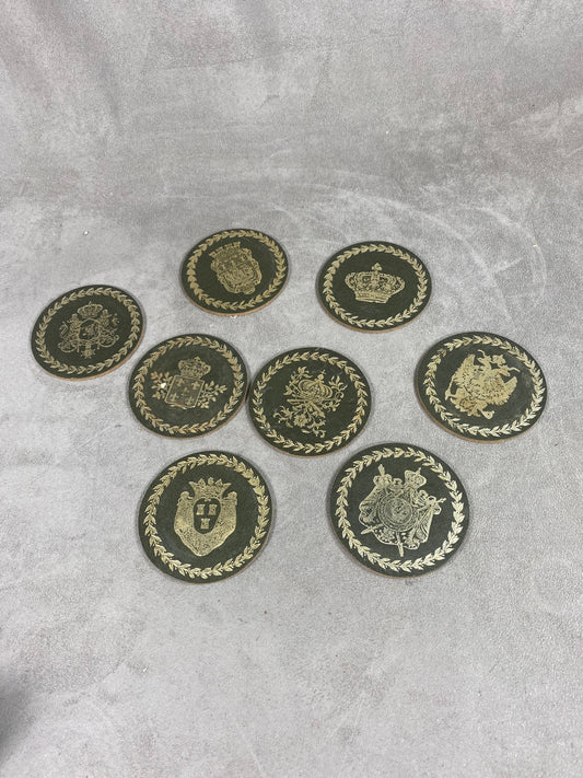 Set of 8 coasters decorated with the coats of arms of the Swedish royal families in cork Made in Sweden Circa 1980