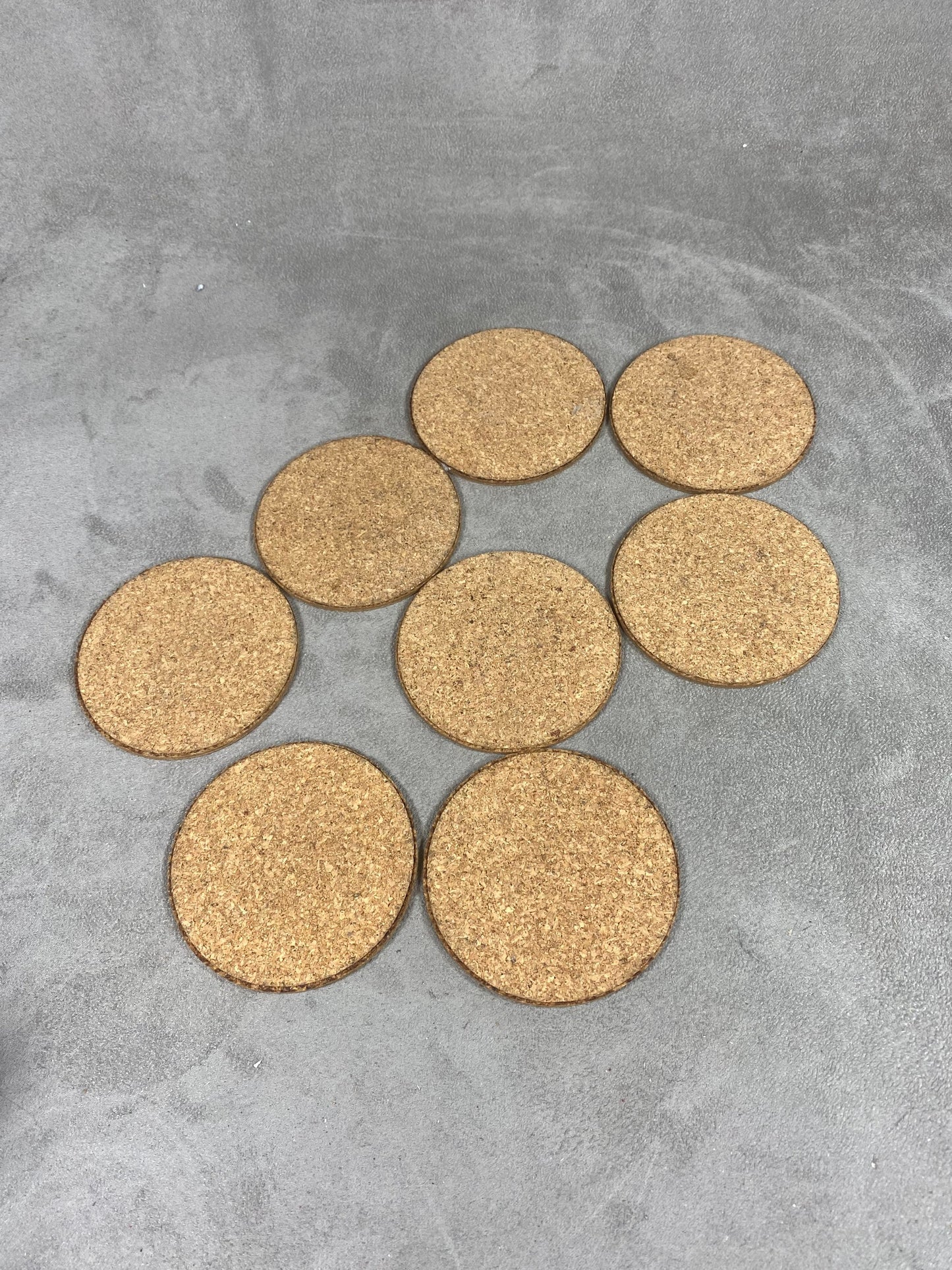 Set of 8 coasters decorated with the coats of arms of the Swedish royal families in cork Made in Sweden Circa 1980