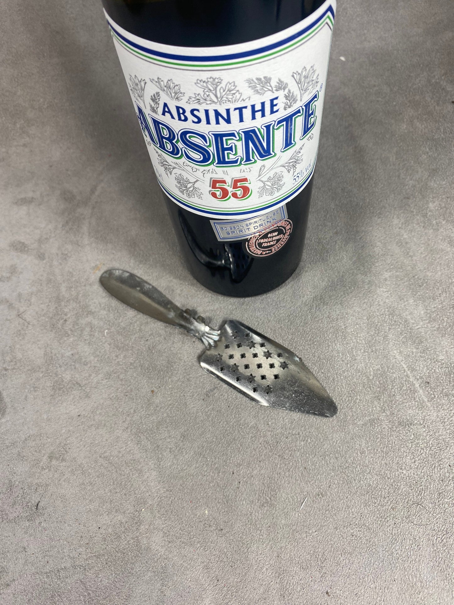 Ancienne cuillère à absinthe en metal extra blanc vintage 1900 Made in France