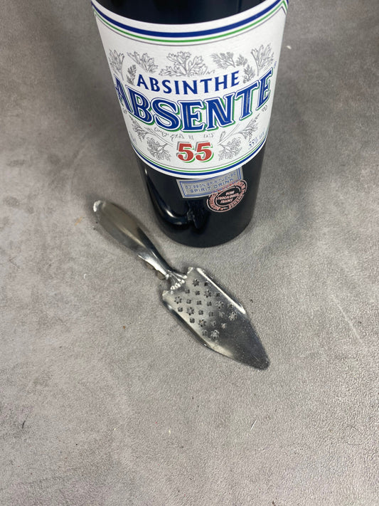 Ancienne cuillère à absinthe en metal extra blanc vintage 1900 Made in France