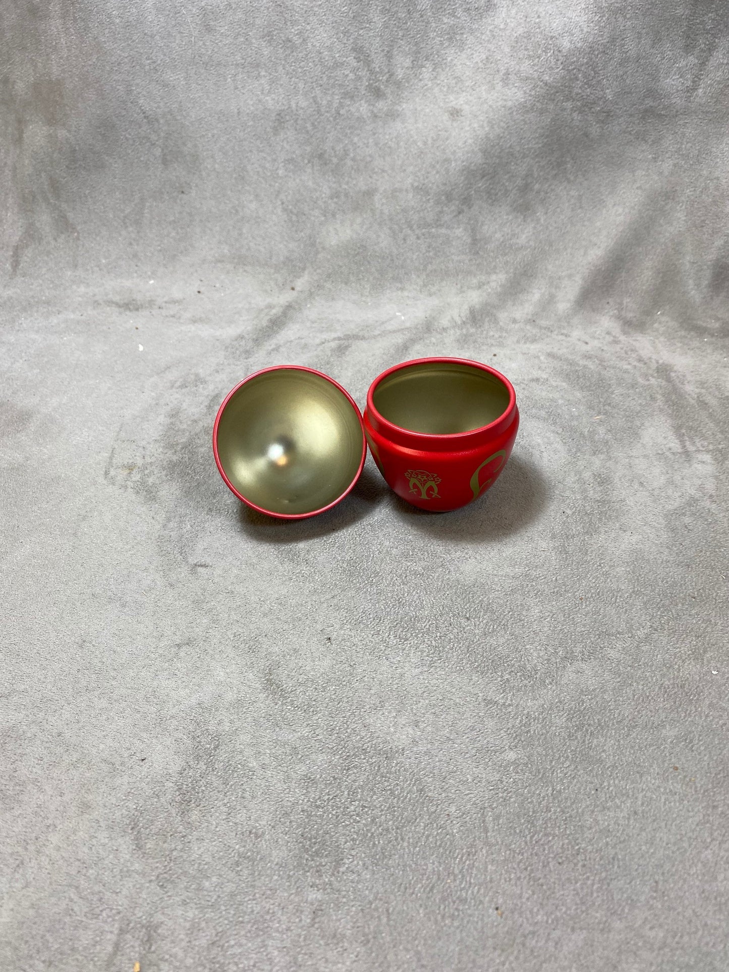 Empty red aluminum egg-shaped box vintage Maxim's de Paris 1990s