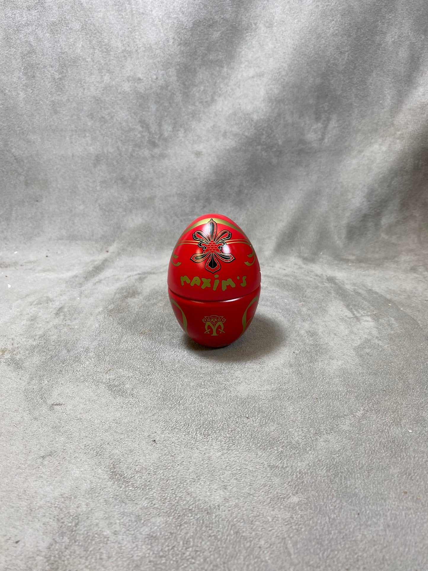 Empty red aluminum egg-shaped box vintage Maxim's de Paris 1990s