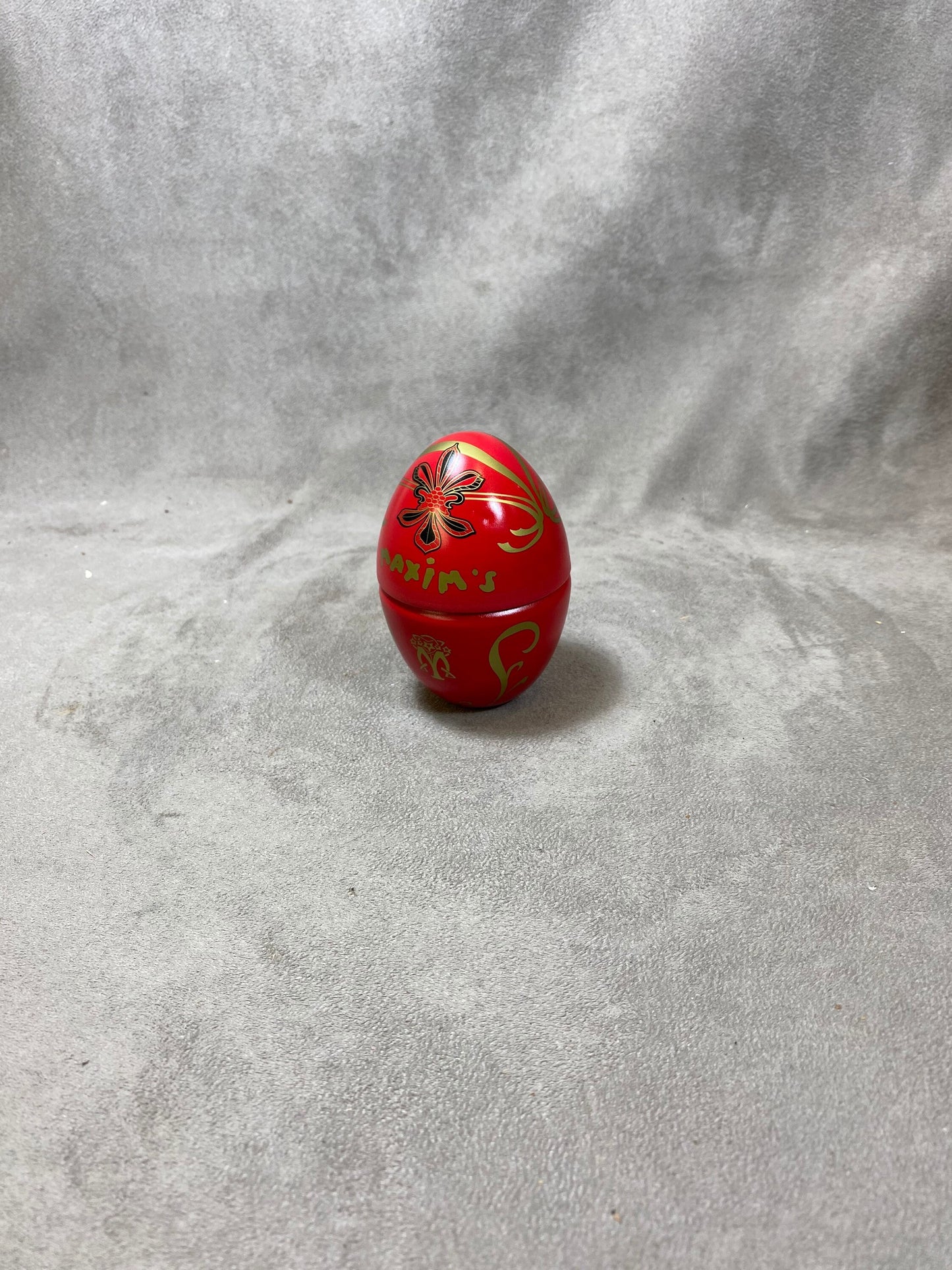 Empty red aluminum egg-shaped box vintage Maxim's de Paris 1990s