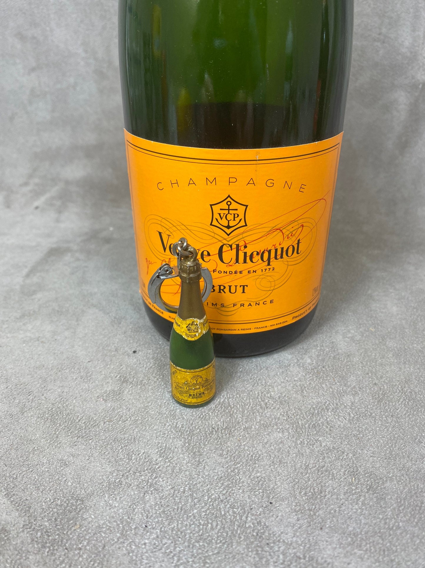 RARE Veuve Clicquot plastic key ring with champagne bottle decoration Made in France 1960s