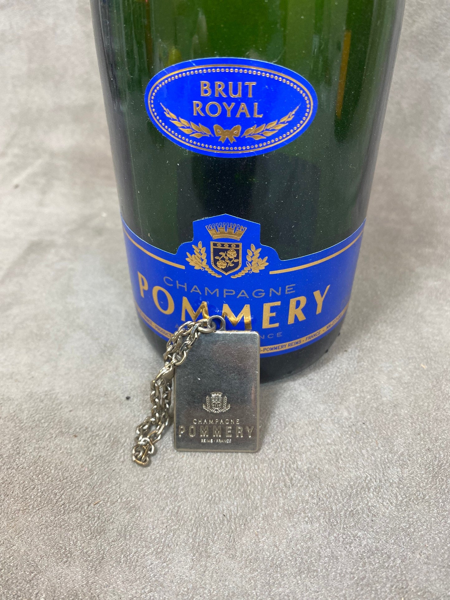 Pommery metal key ring Made in France 1960s