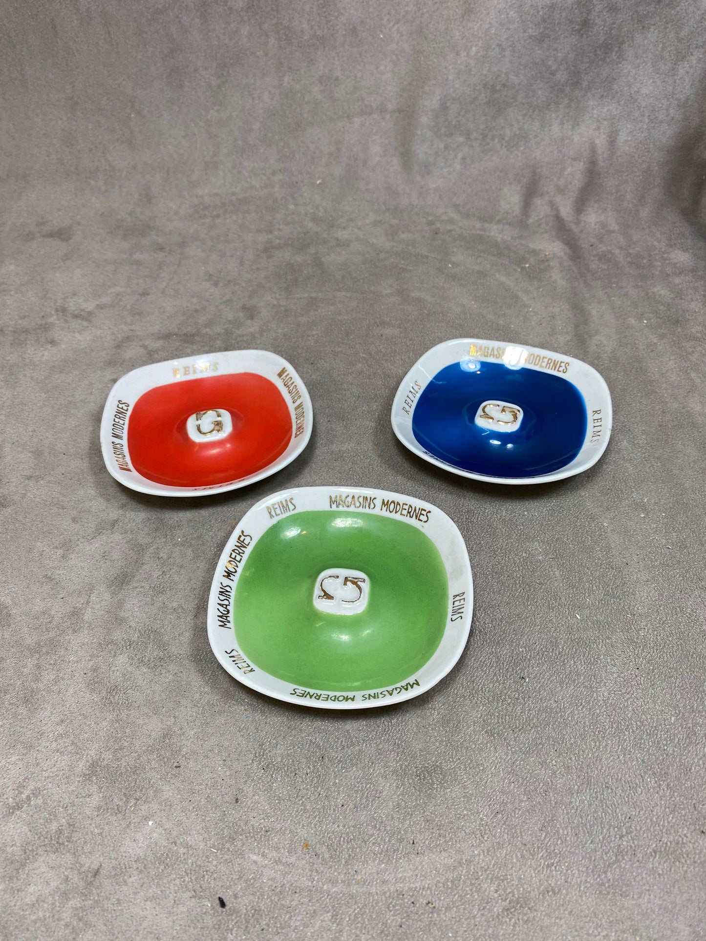 Lot of 3 vintage blue green and red ashtrays from Magasins Modernes de Reims formerly Les Galeries Lafayette Made in France 1924