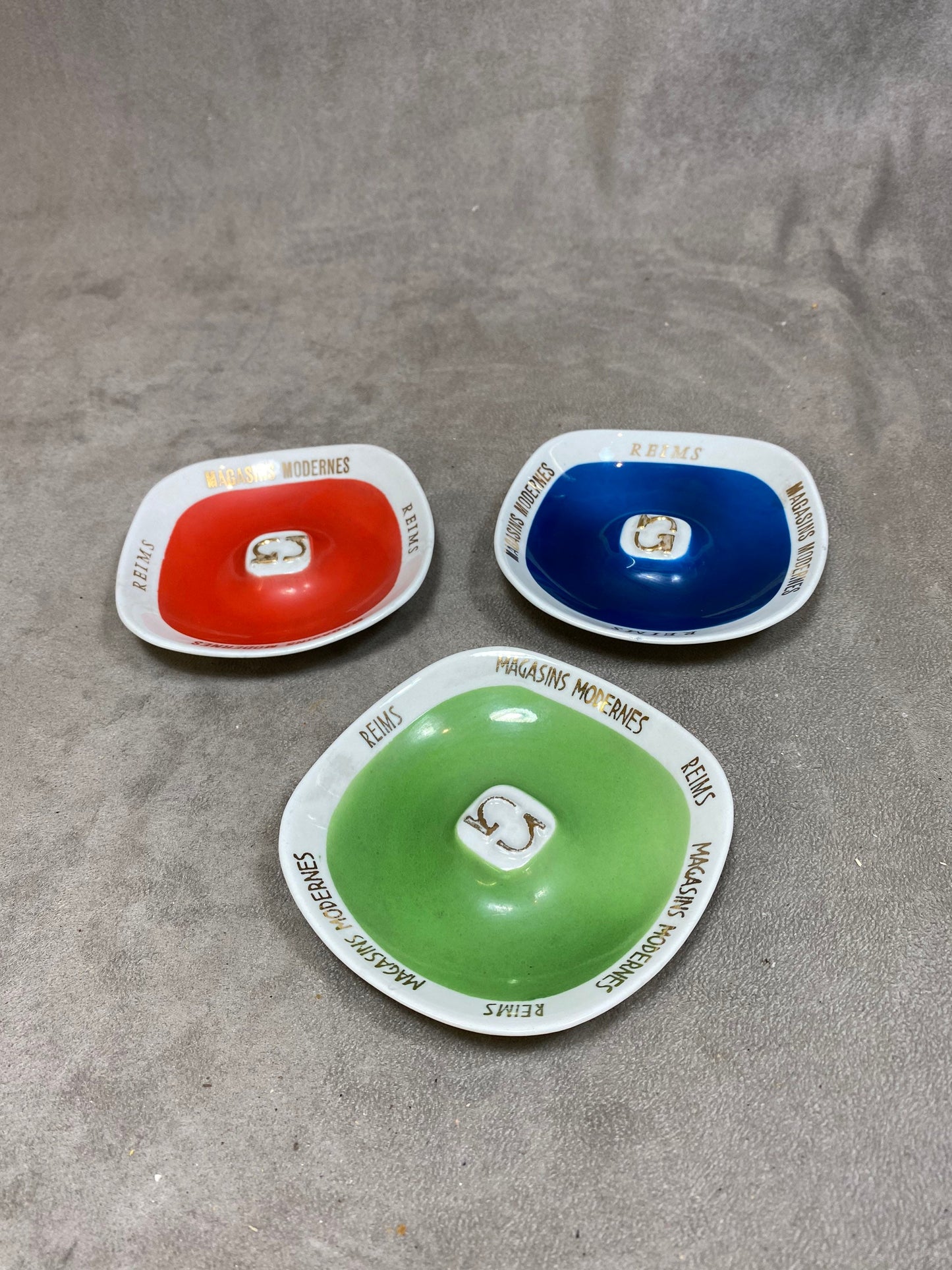 Lot of 3 vintage blue green and red ashtrays from Magasins Modernes de Reims formerly Les Galeries Lafayette Made in France 1924