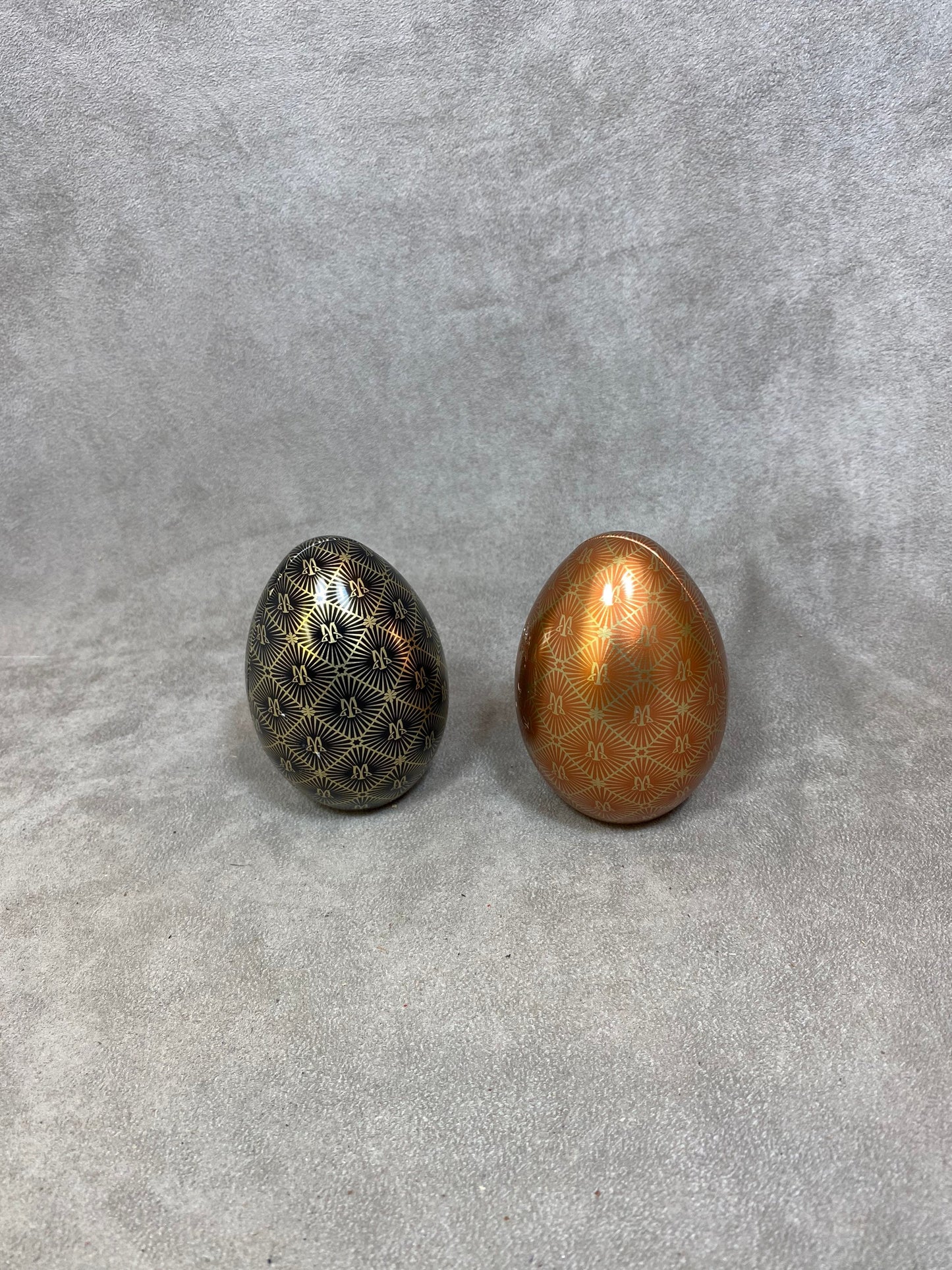 Set of 2 empty red aluminum boxes in the shape of a vintage egg Maxim's de Paris 1990s
