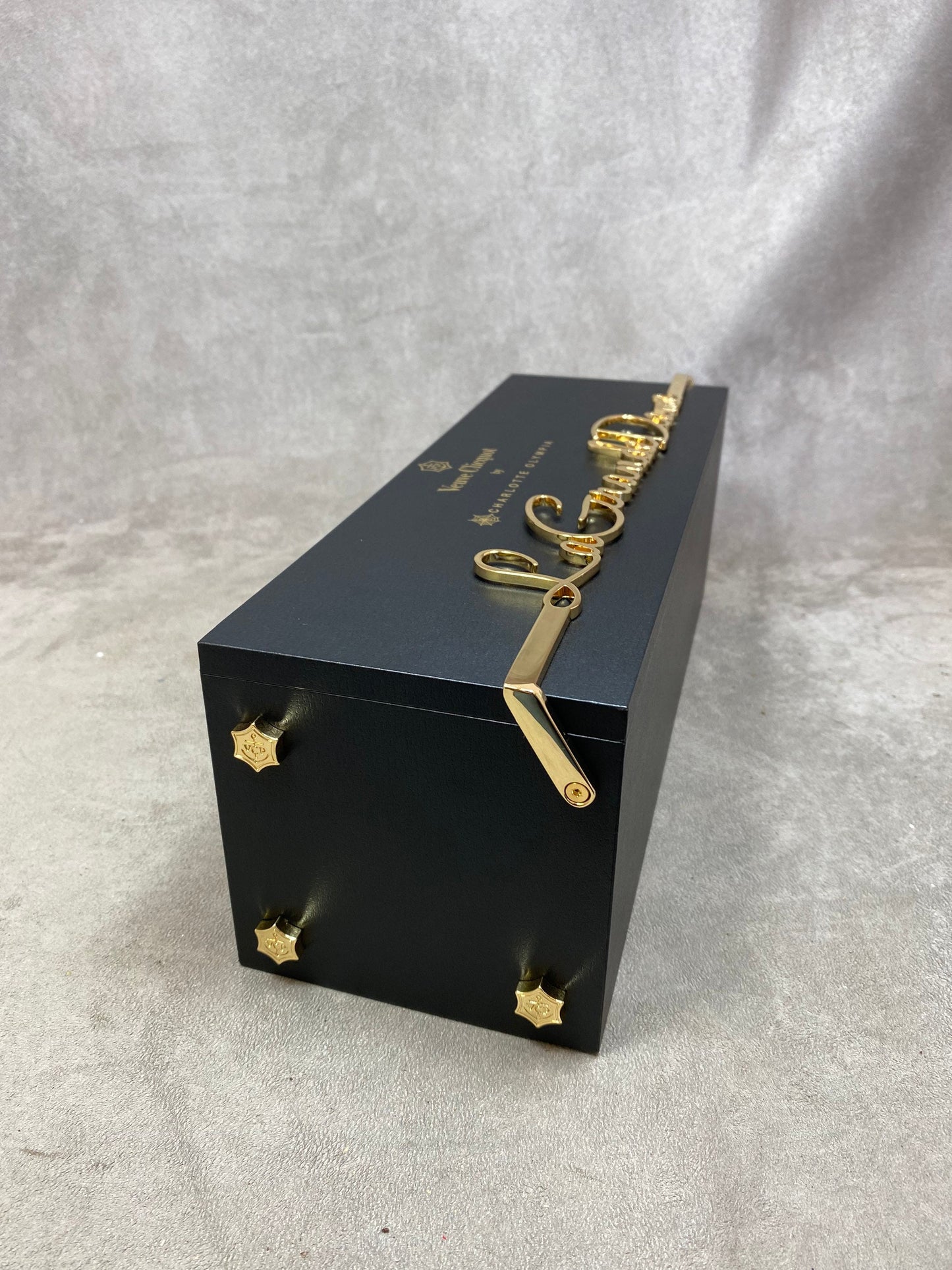 VERY RARE Veuve Clicquot black bottle holder in wood and gold metal La Grande Dame Clicquot by Charlotte Olympia 1990s