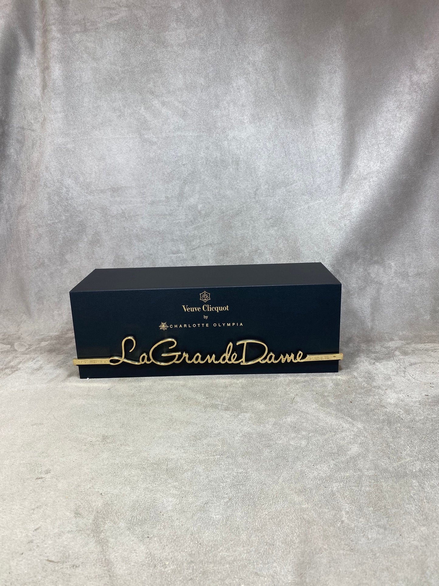 VERY RARE Veuve Clicquot black bottle holder in wood and gold metal La Grande Dame Clicquot by Charlotte Olympia 1990s