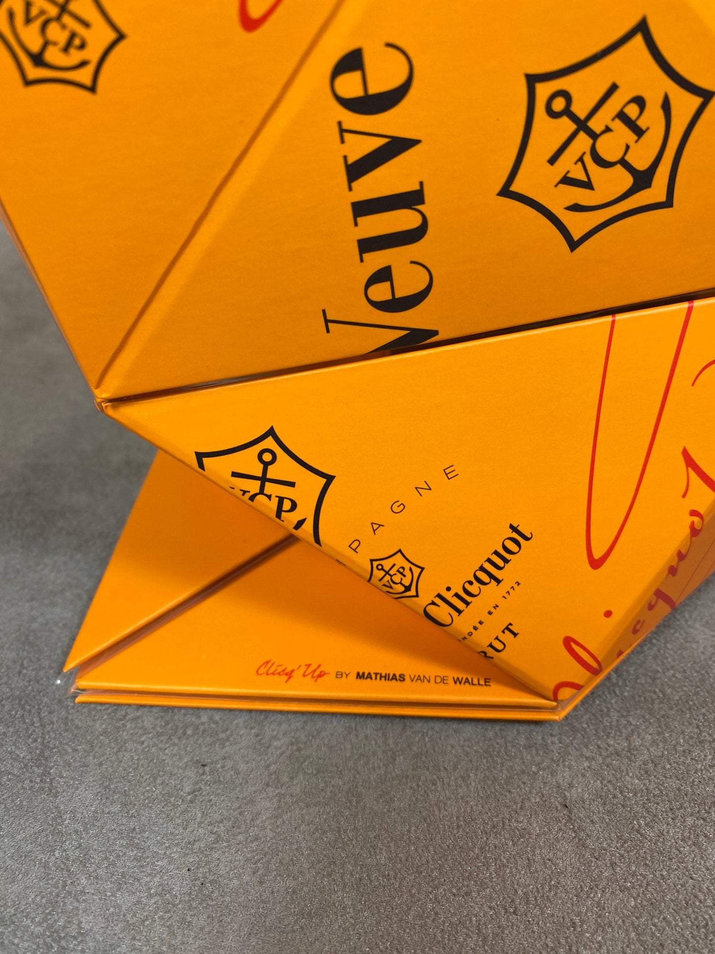 Vintage Veuve Clicquot Clicq'up folding champagne bucket by Mathias van de Walle in cardboard and orange plastic 1990s