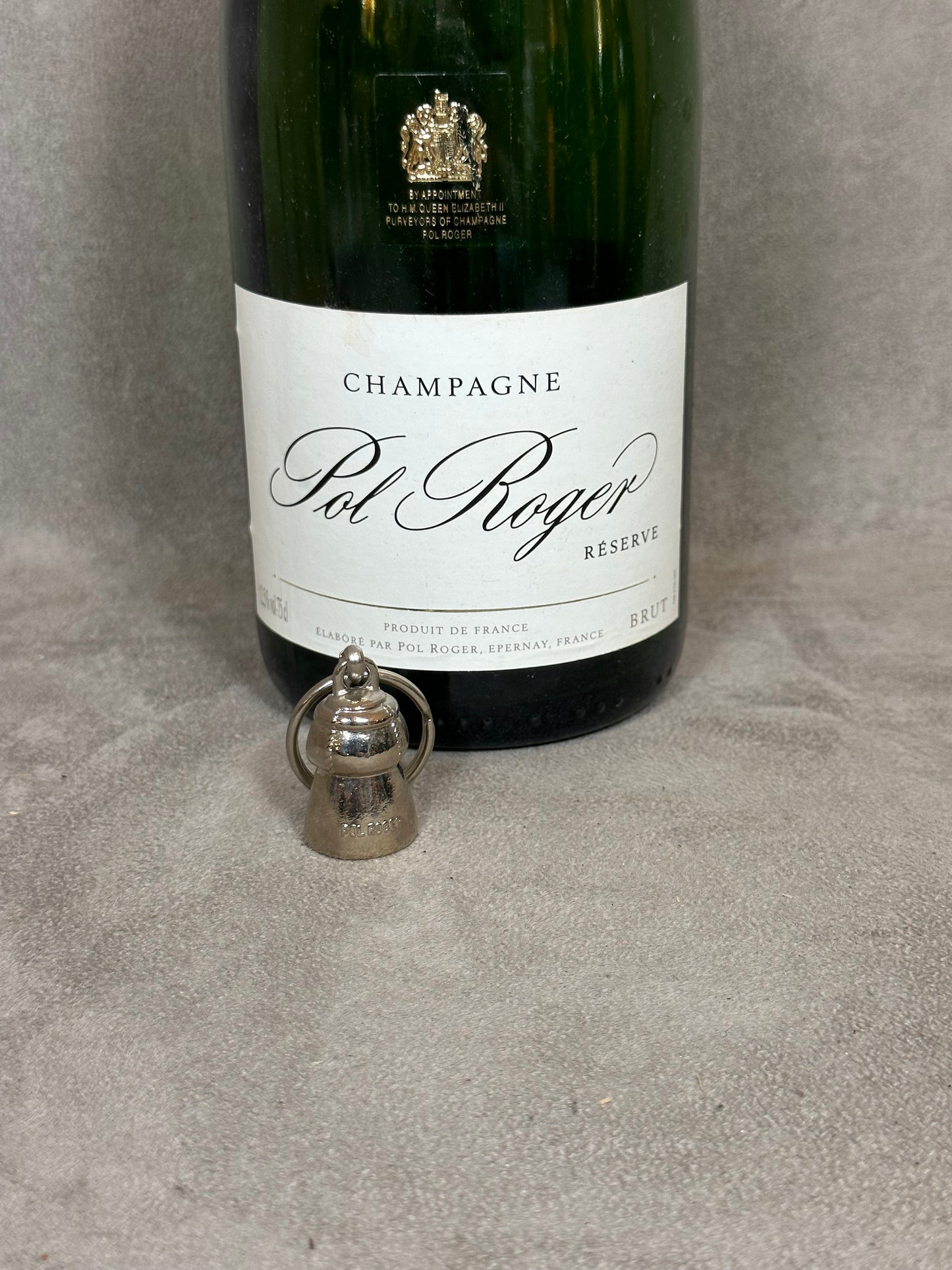 Porte clés Pol Roger en métal argenté en forme de bouchon de champagne Made in France Années 1980