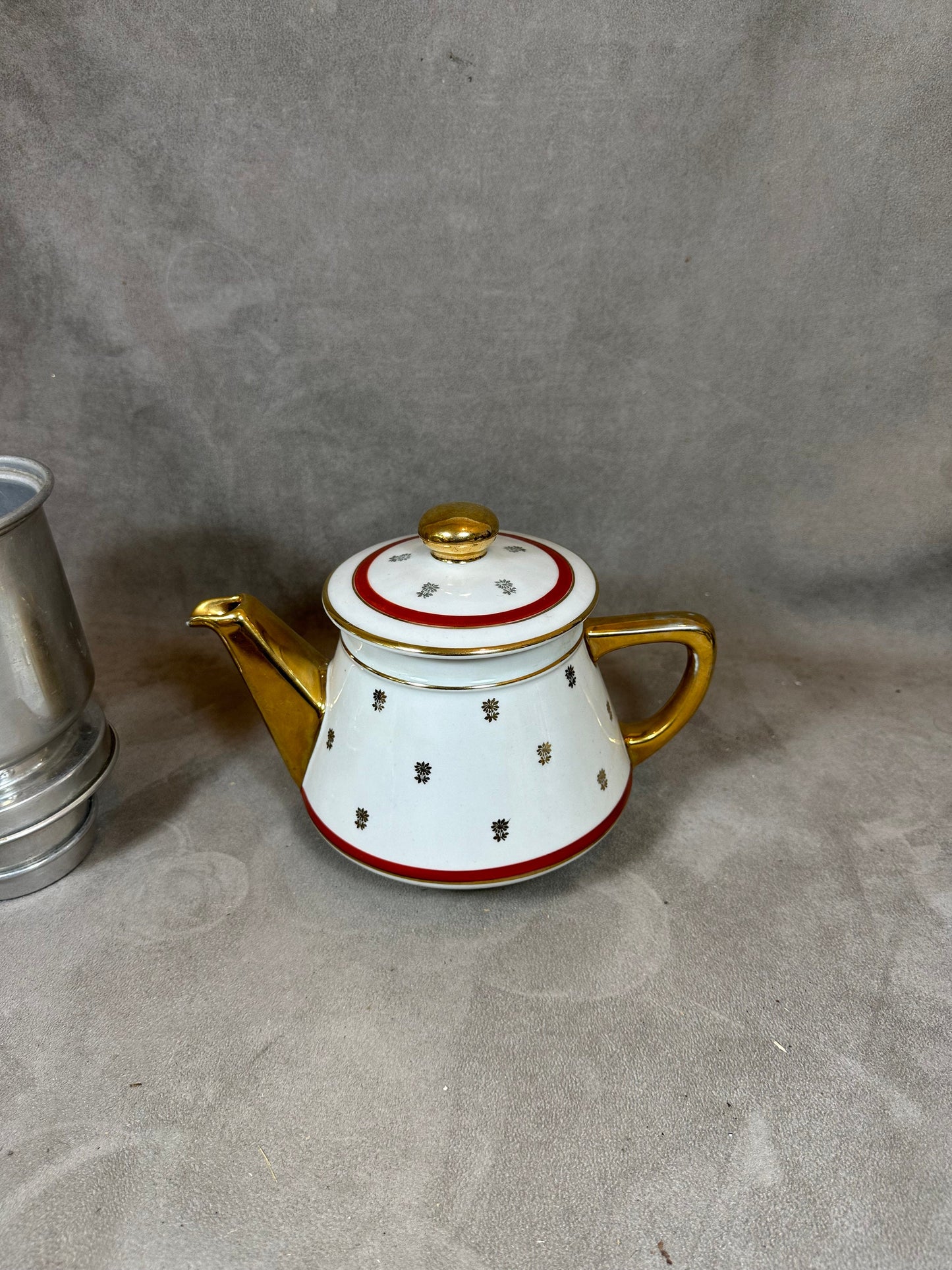 RARE Salam silver filter coffee maker on vintage red and white earthenware with gold details from the 1960s