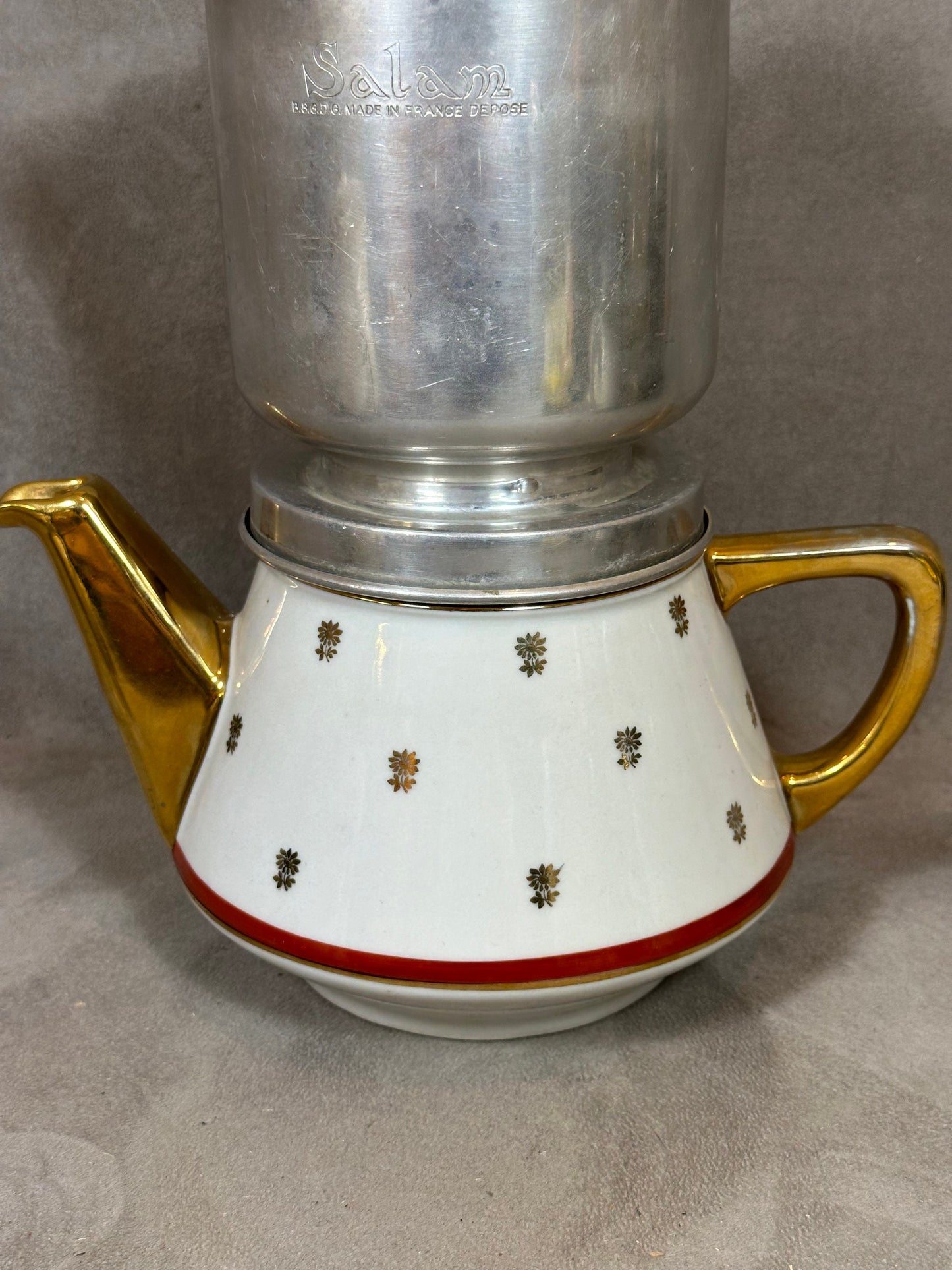 RARE Salam silver filter coffee maker on vintage red and white earthenware with gold details from the 1960s