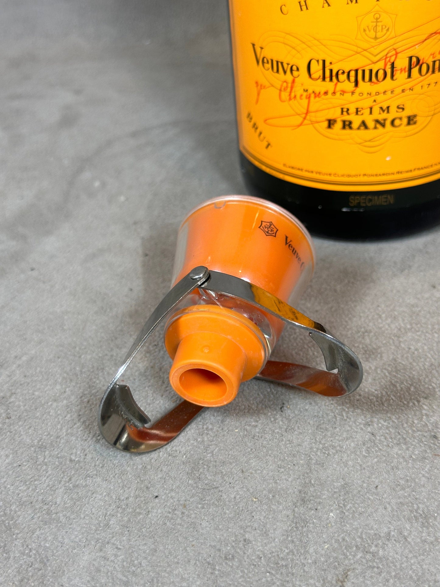 Trendy line stopper for opened bottles of Veuve Cliquot Ponsardin champagne